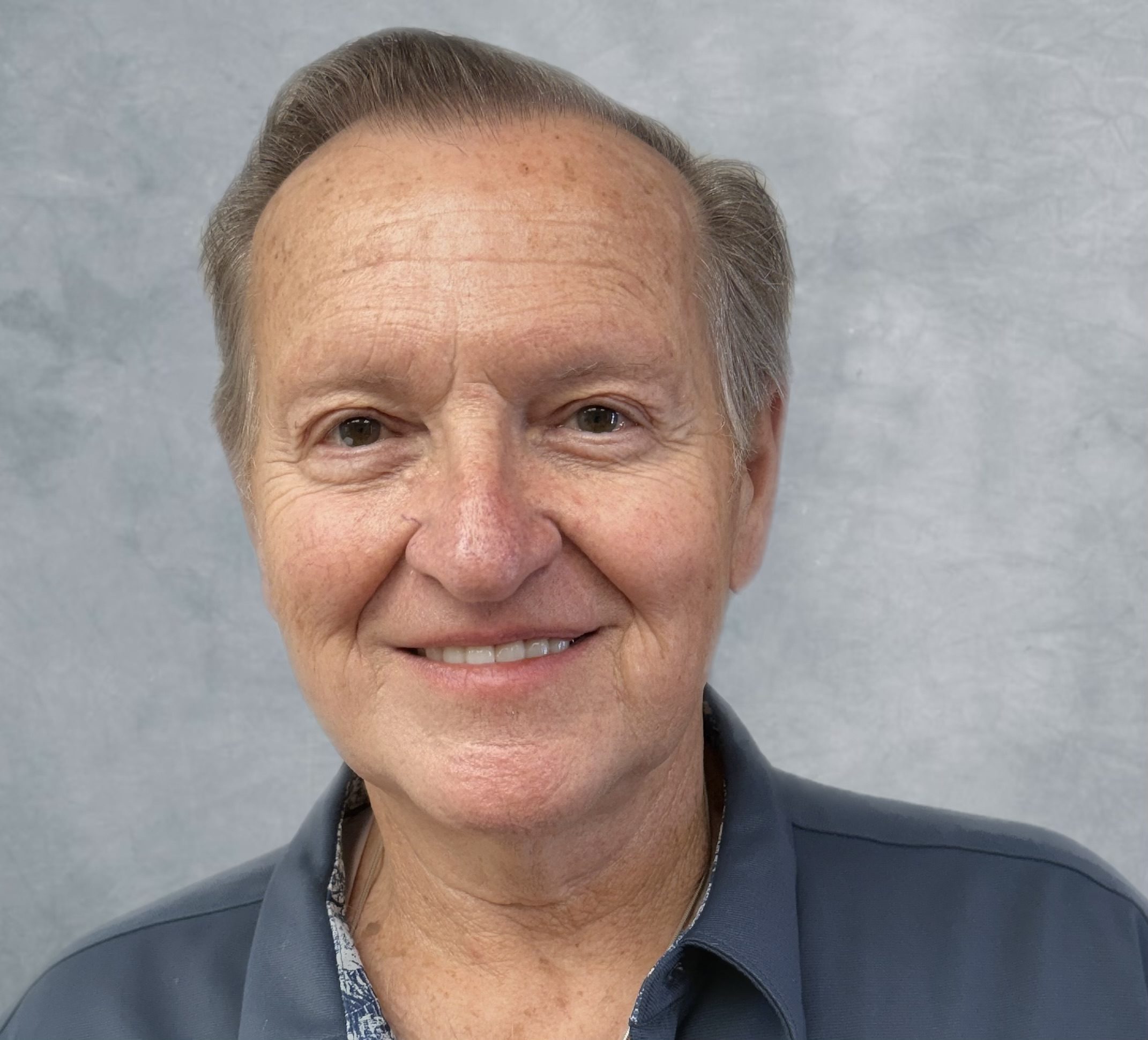 Close-up of smiling older man's face